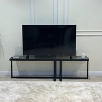 طاولة تلفزيون حديد أسود زجاج أسود شفاف