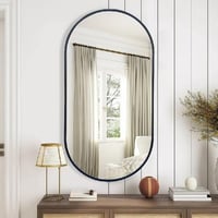 مرايا جدارية بإطار أسود شكل بيضاوي مقاس 140×70 سم