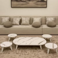 طقم طاولات ارضي خشب أبيض شكل بيضاوي - بتصميم أنيق...