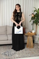 فستان سهرة أسود مخمل بتطريز ذهبي فاخر وتصميم أنيق...