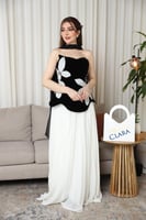 فستان سهرة أبيض وأسود بتطريز لؤلؤي فاخر وتصميم أنث...