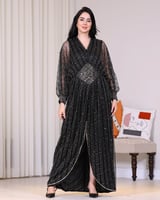 فستان ترتر فاخر أسود بقصة خصر أنيقة | سيدتي