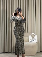 فستان فاخر بخطوط ثنائية اللون بلمسة راقية