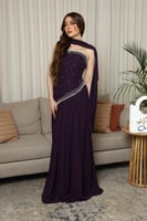 فستان سهرة بنفسجي مطرز بحبات اللؤلؤ ولمسة شيفون را...