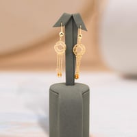 عقد بديل الذهب الدوائر المتدلية