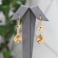 حلق بديل الذهب لمسة الذهب