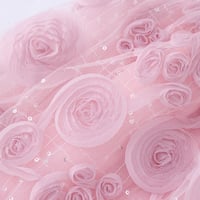 فستان بي بي تل مزين بالورود وأبه مموجة وأنيقة