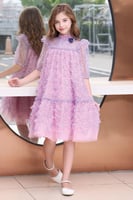 فستان تل هاينك يجمع ما بين اللونين الوردي والارجوا...