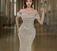 فستان سهرة أبيض بتصميم كب بدون أكمام | لؤلؤة الأنا...