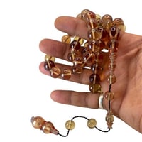 سبحة فاتوران تركي زيتي شفاف (تمليكه) – خراطة تركية