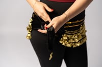 حزام خصر بجنيهات كبيرة