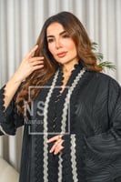 عباية جاكار مشجَر مع التخريم المموج وكلفة الشك في...