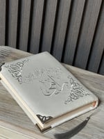 مصحف مطرز بالاسم