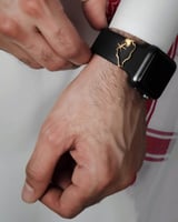 بروش ساعه يحمل خريطة المملكة و سيفين ونخله