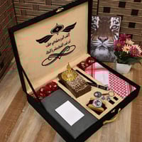 بوكس إهداء رجالي فخم بقماش راقي مع شماغ وإكسسوارات...