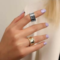 دبل راقية من الفضة الخالصة مطلية ذهب ومطعمة بفصوص...