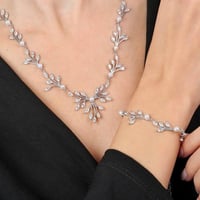 طقم فضة مصاغ بلمسة من الفخامة مرصع بأججار اللؤلؤ و...