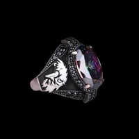 خاتم فضة راقي مرصع بحجر الكسندرايت و رأس الصقر - م...