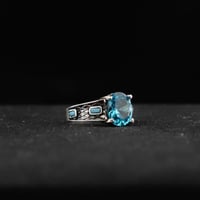 خاتم فضة أنيق بحجر زركون أزرق مميز وفصوص فيروز جان...