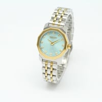 ساعة نسائية بلون فضي