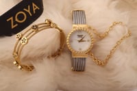 طقم نسائي عصري يحتوي على ساعه استيل مميزه مع اسوار...