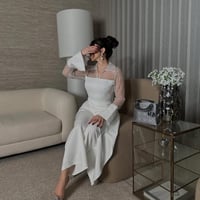 جمبسوت العيد أبيض فخم باربي بأكمام شفافة مطرزة