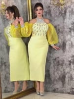 فستان العيد اصفر ناعم طول ميد كسرات