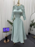 فستان "سماوي ملكي" بقطعتين وتطريز يدوي فاخر