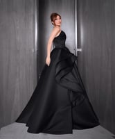 فستان يارا سهرة لونين اسود وفوشي خامة تفته لمعة