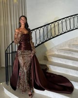 فساتين دانتيل شفاف بتطريز فخم وزهور ثلاثية الأبعاد