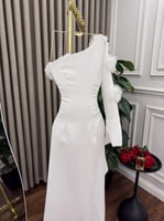 لبس العيد يجمع بين الفستان والجمبسوت