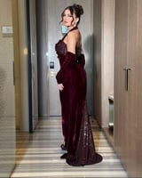 إطلالة ملكية بفستان سهرة فاخر من المخمل والترتر