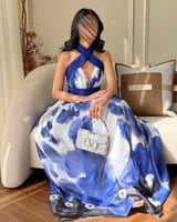 فستان سهرة مشجر لونين كحلى وتفاحي