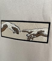 هودي فن التطريز لمايكل أنجلو