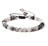 اسورةمن حجر روتيلاديد كوارتز (rutilated quartz)