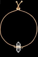 اسورة ذهبية مع حجر كلير كوارتز الخام