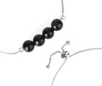 اسورة فضية مع حجر عقيق اسود ( Black Agate )