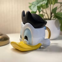 كوب ديزني ستور - العم بطوط