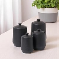 طقم علب البهارات بغطاء بتصميم عصري لون اسود - 4 حب...