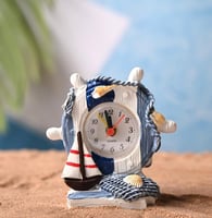 ساعة مكتب بتصميم دفة السفينة لون ابيض و ازرق مقاس...