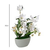 مركن زرع مصممم بشكل عصري باللون الرمادي مع زهور صن...