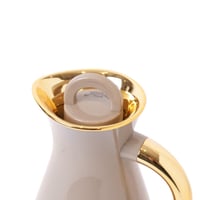 ترمس الشاي والقهوة بتصميم عصري باللون البيج والذهب...