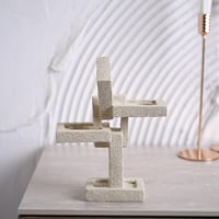 شمعدان بتصميم متشابك باللون البيج مقاس 24 سم