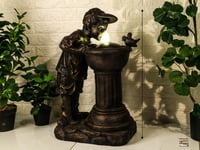 نافورة بتصميم ولد صغير يلعب بلماء مع العصافير لون...