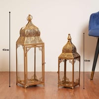 طقم فوانيس بتصميم مميز احجام مختلفة معدن لون ذهبي...
