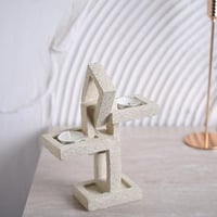 شمعدان بتصميم متشابك باللون البيج مقاس 24 سم