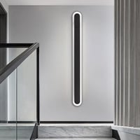 إضاءة حائط بلون انارة اصفر بتصميم مميز لون اسود