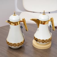 طقم ترامس بتصميم عصري باللون الابيض والذهبي