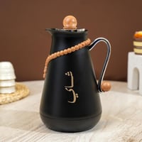 ترمس مفرد بتصميم مميز بعبارة (شاي) باللون الاسود و...