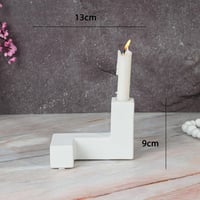 شمعدان سيراميك باللون الابيض بتصميم فريد و رائع